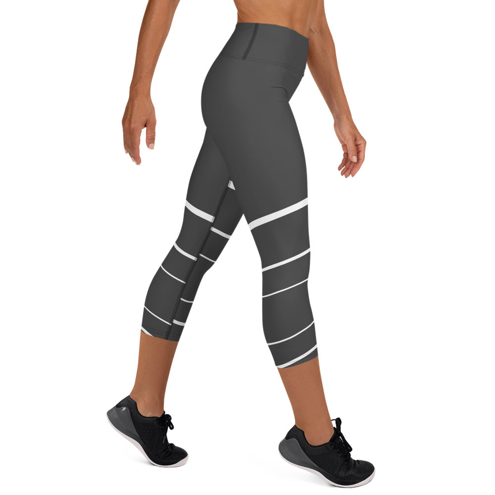 Elevate your active wardrobe with our Elevated Essence Yoga Capris. The sleek and comfortable design of these capris make them perfect for any activity, from hiking and biking to gardening and traveling. The high-quality fabric wicks away sweat and dries quickly, so you can stay comfortable during even the most intense workouts.