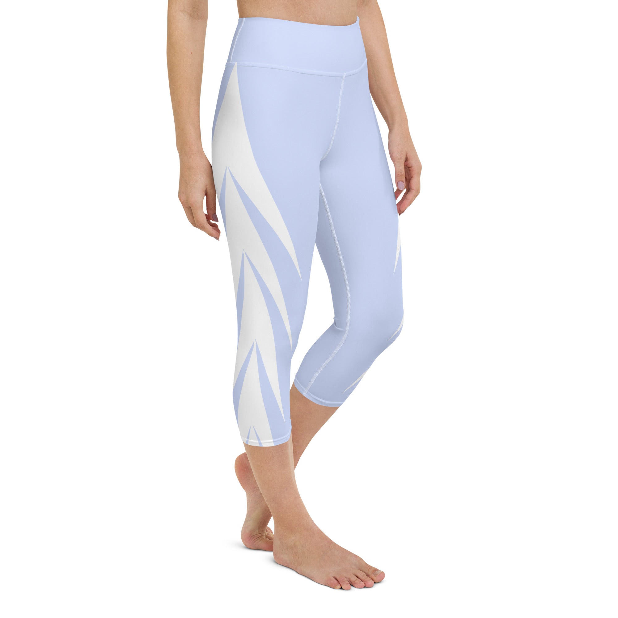 Experience ultimate comfort and style with our Altitude yoga capri leggings! Featuring a high, elastic waistband for a secure and flattering fit, these leggings are the perfect choice for any activity, from yoga to the gym or just lounging at home. Made with a super soft and stretchy microfiber yarn, these capris will ensure your comfort and flexibility no matter what the day brings.