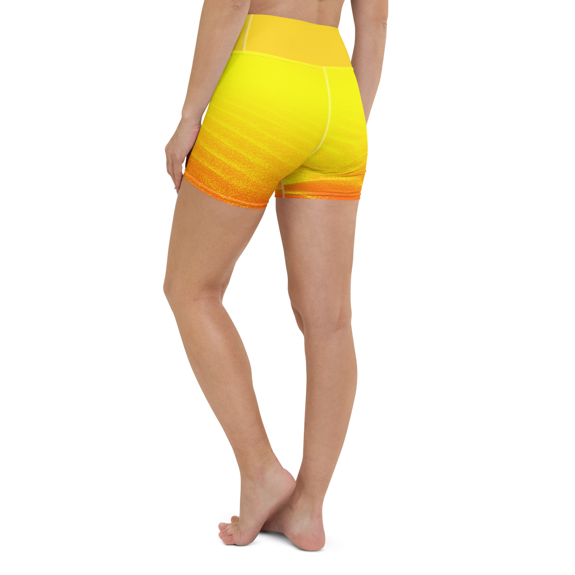 Get ready to feel comfortable and stylish with these Sunset Sands yoga shorts. Made from a soft microfiber yarn, these leggings feature a wide elastic waistband that flatters your curves and keeps you feeling secure during your workout. With a beautiful sunset-inspired design, these yoga shorts are perfect for anything from evening runs to gym workouts.