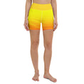 Load image into Gallery viewer, Get ready to feel comfortable and stylish with these Sunset Sands yoga shorts. Made from a soft microfiber yarn, these leggings feature a wide elastic waistband that flatters your curves and keeps you feeling secure during your workout. With a beautiful sunset-inspired design, these yoga shorts are perfect for anything from evening runs to gym workouts.
