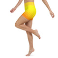 Load image into Gallery viewer, Get ready to feel comfortable and stylish with these Sunset Sands yoga shorts. Made from a soft microfiber yarn, these leggings feature a wide elastic waistband that flatters your curves and keeps you feeling secure during your workout. With a beautiful sunset-inspired design, these yoga shorts are perfect for anything from evening runs to gym workouts.
