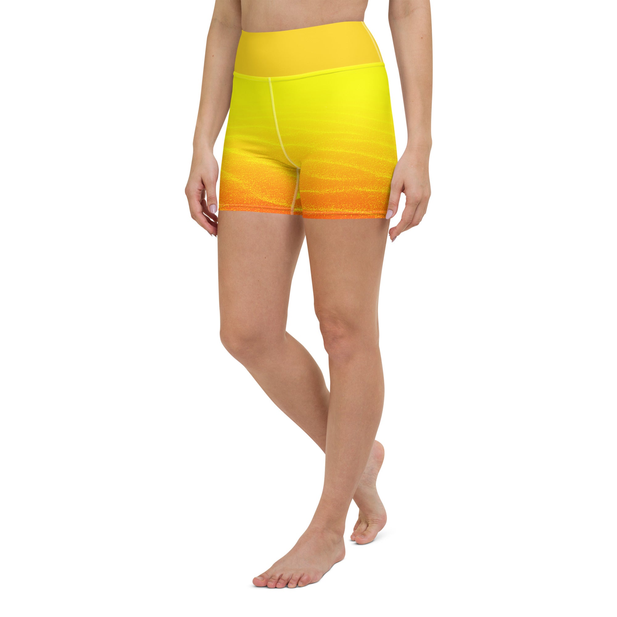 Get ready to feel comfortable and stylish with these Sunset Sands yoga shorts. Made from a soft microfiber yarn, these leggings feature a wide elastic waistband that flatters your curves and keeps you feeling secure during your workout. With a beautiful sunset-inspired design, these yoga shorts are perfect for anything from evening runs to gym workouts.