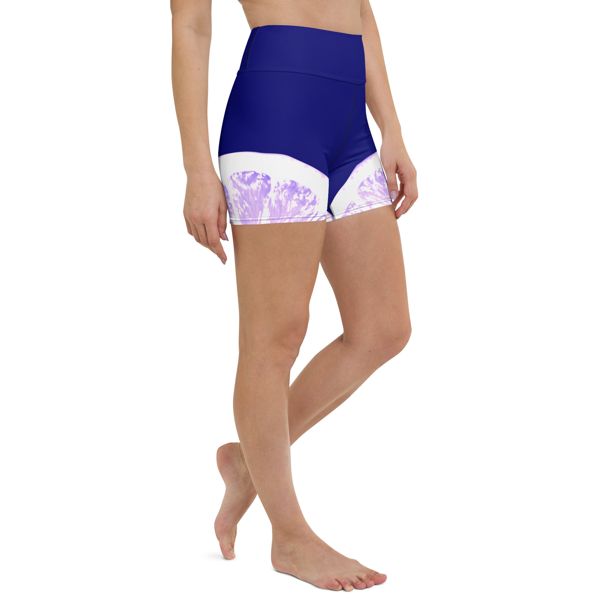 Experience the perfect blend of comfort and style with these playful Citrus Burst yoga shorts. The high waistband and soft microfiber yarn provide the ultimate in comfort, while the fun grapefruit pattern adds a touch of quirkiness to your workout routine.