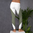 Load image into Gallery viewer, Experience the perfect blend of style and comfort with our Emerald Lane leggings. Made from high-quality polyester and spandex blend, these leggings offer a smooth and comfortable feel with four-way stretch that ensures they will never lose their shape.
