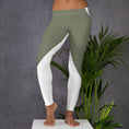 Load image into Gallery viewer, Experience the perfect blend of style and comfort with our Emerald Lane leggings. Made from high-quality polyester and spandex blend, these leggings offer a smooth and comfortable feel with four-way stretch that ensures they will never lose their shape.
