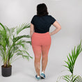 Load image into Gallery viewer, Slip into comfort and style with these plus size leggings. The breathable fabric, wide elastic waistband, and flattering fit make these leggings perfect for everything from your morning jog to your afternoon lounge. The playful butterfly and tropical designs will uplift your mood and add a touch of fun to your outfit. Feel confident and relaxed no matter where your day takes you!
