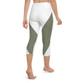 Load image into Gallery viewer, Elevate your workout wardrobe with these stylish and comfortable Emerald Lane capri leggings. Featuring a high, elastic waistband that hugs your curves and a four-way stretch microfiber fabric that moves with you, these leggings are perfect for yoga, the gym, or a cozy evening at home.
