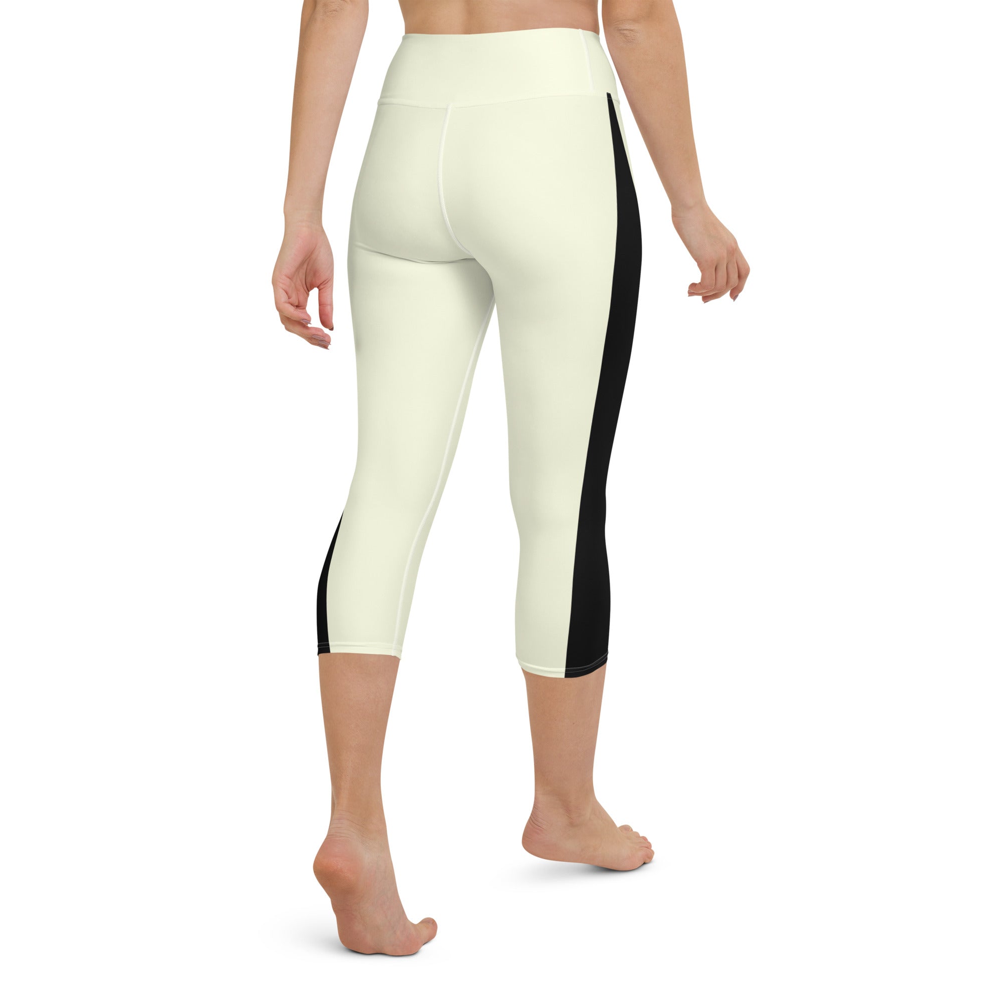 Introducing our Lemon Slice Yoga Capris - the perfect blend of comfort and style for your active lifestyle. These capris feature a high, elastic waistband that ensures a secure and comfortable fit during any yoga pose or workout.