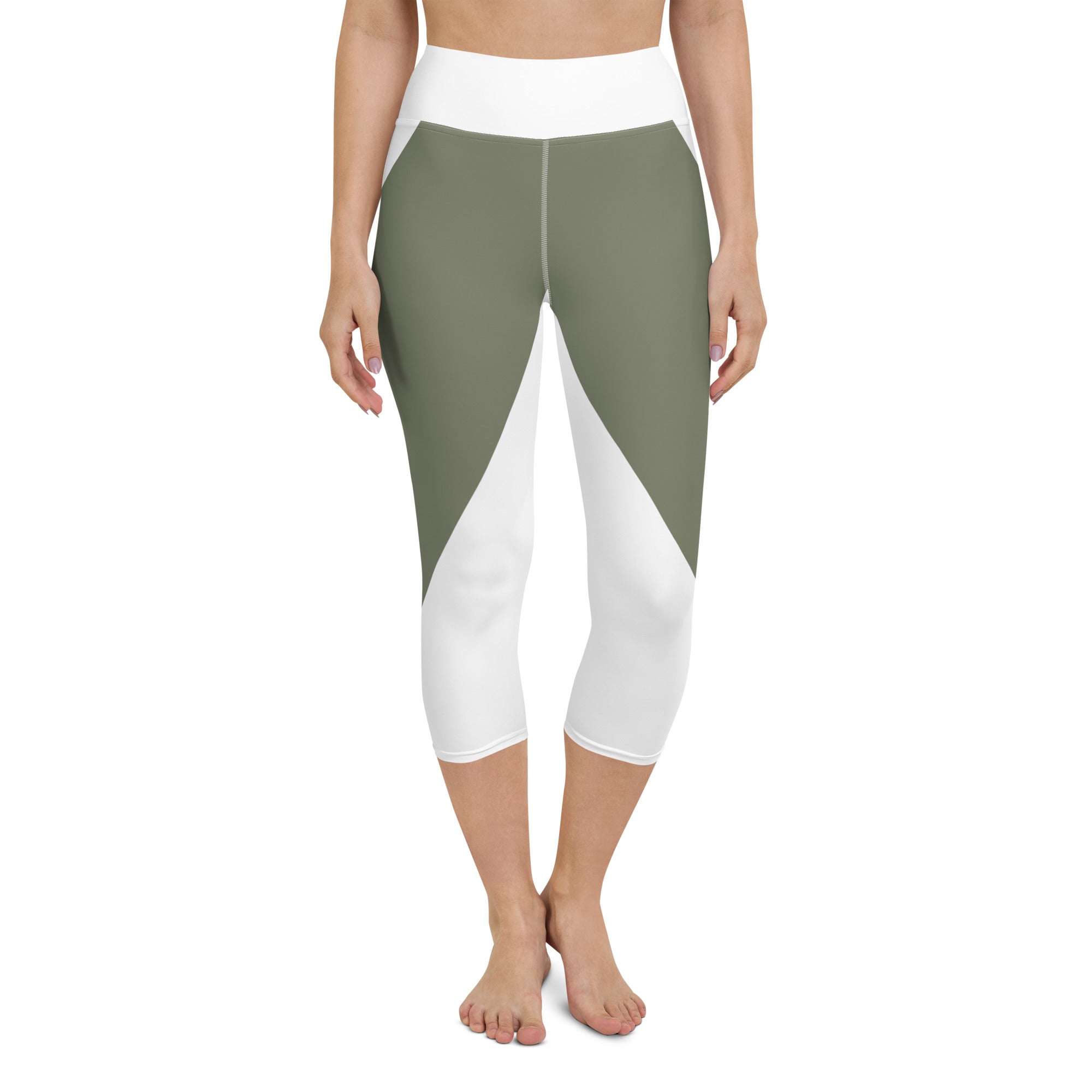 Elevate your workout wardrobe with these stylish and comfortable Emerald Lane capri leggings. Featuring a high, elastic waistband that hugs your curves and a four-way stretch microfiber fabric that moves with you, these leggings are perfect for yoga, the gym, or a cozy evening at home.