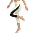 Load image into Gallery viewer, Introducing our Lemon Slice Yoga Capris - the perfect blend of comfort and style for your active lifestyle. These capris feature a high, elastic waistband that ensures a secure and comfortable fit during any yoga pose or workout.
