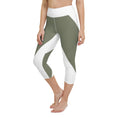 Load image into Gallery viewer, Elevate your workout wardrobe with these stylish and comfortable Emerald Lane capri leggings. Featuring a high, elastic waistband that hugs your curves and a four-way stretch microfiber fabric that moves with you, these leggings are perfect for yoga, the gym, or a cozy evening at home.
