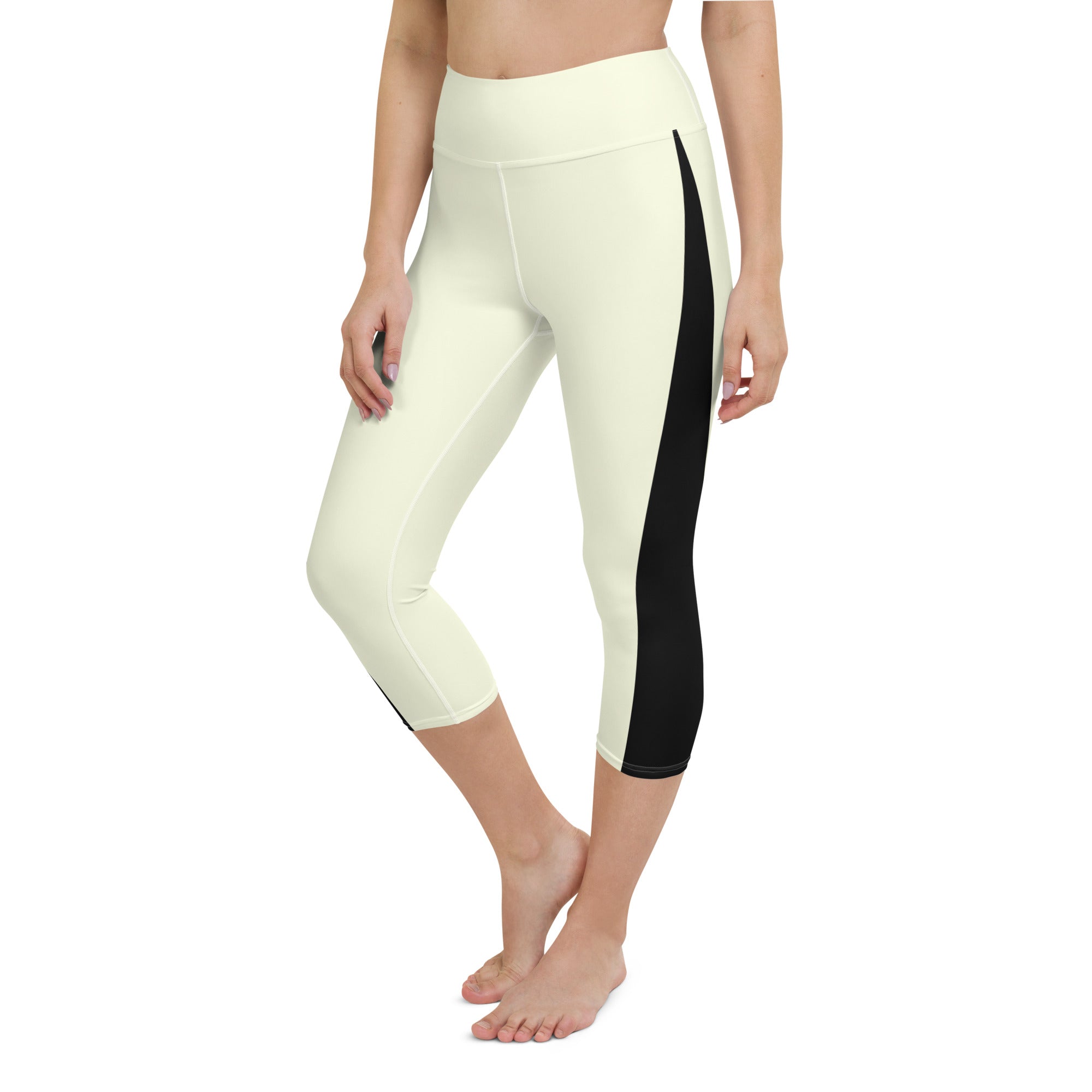 Introducing our Lemon Slice Yoga Capris - the perfect blend of comfort and style for your active lifestyle. These capris feature a high, elastic waistband that ensures a secure and comfortable fit during any yoga pose or workout.