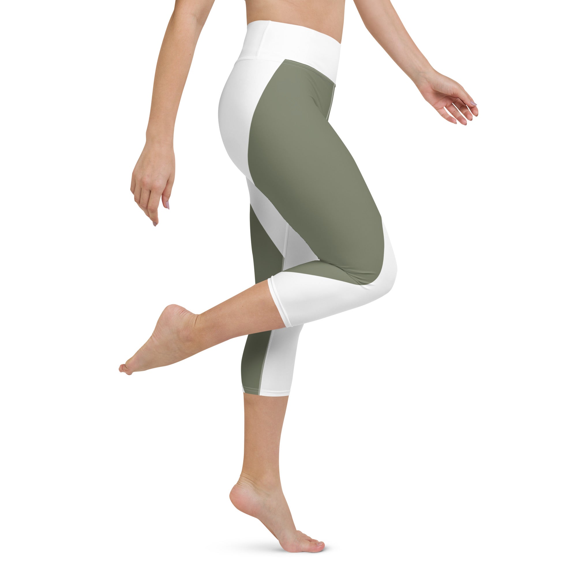 Elevate your workout wardrobe with these stylish and comfortable Emerald Lane capri leggings. Featuring a high, elastic waistband that hugs your curves and a four-way stretch microfiber fabric that moves with you, these leggings are perfect for yoga, the gym, or a cozy evening at home.