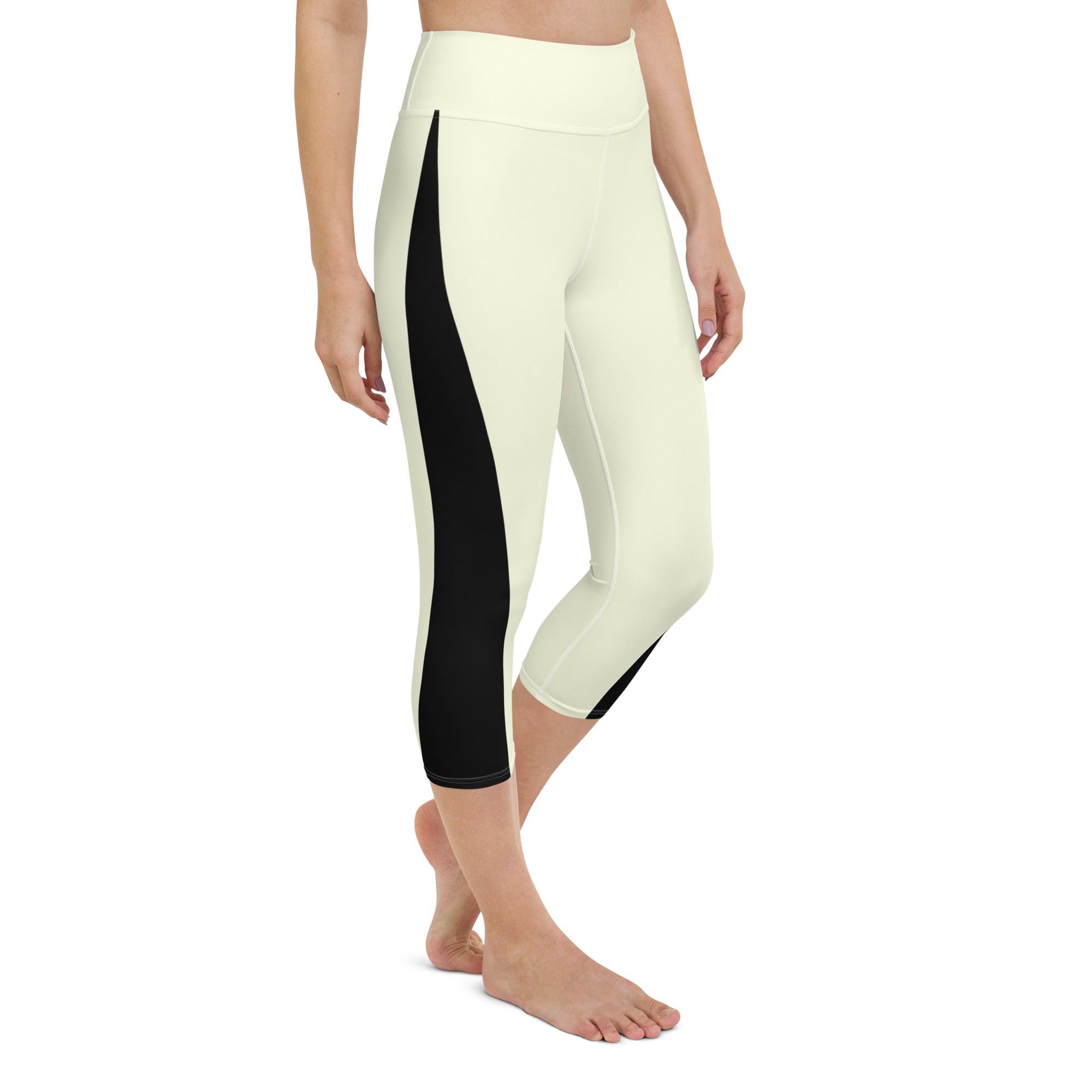 Introducing our Lemon Slice Yoga Capris - the perfect blend of comfort and style for your active lifestyle. These capris feature a high, elastic waistband that ensures a secure and comfortable fit during any yoga pose or workout.