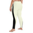 Load image into Gallery viewer, Whether you're hitting the studio or the streets, our Lemon Slice yoga pants have got you covered. The pale yellow color is complemented by a bold black triangle design, creating a unique look that's sure to stand out. 
