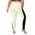 Load image into Gallery viewer, Whether you're hitting the studio or the streets, our Lemon Slice yoga pants have got you covered. The pale yellow color is complemented by a bold black triangle design, creating a unique look that's sure to stand out. 
