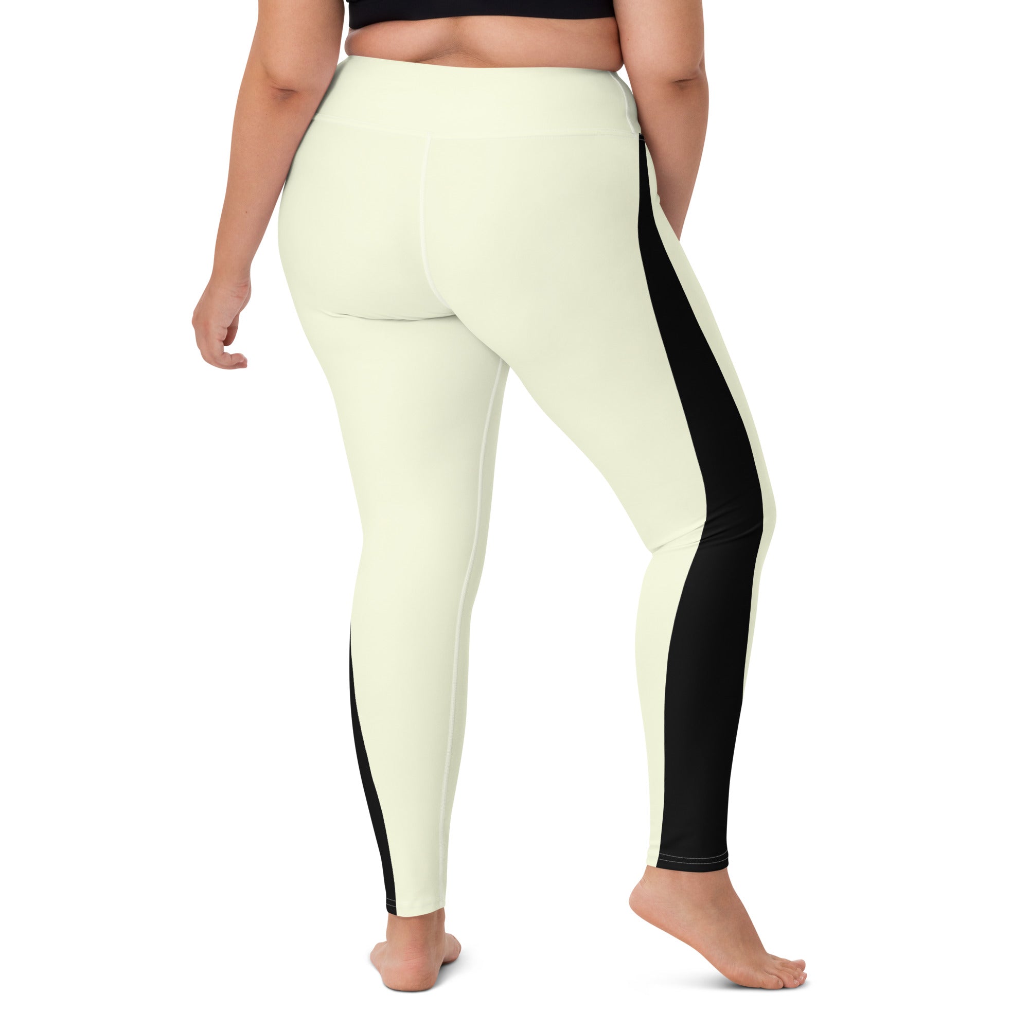 Whether you're hitting the studio or the streets, our Lemon Slice yoga pants have got you covered. The pale yellow color is complemented by a bold black triangle design, creating a unique look that's sure to stand out. 