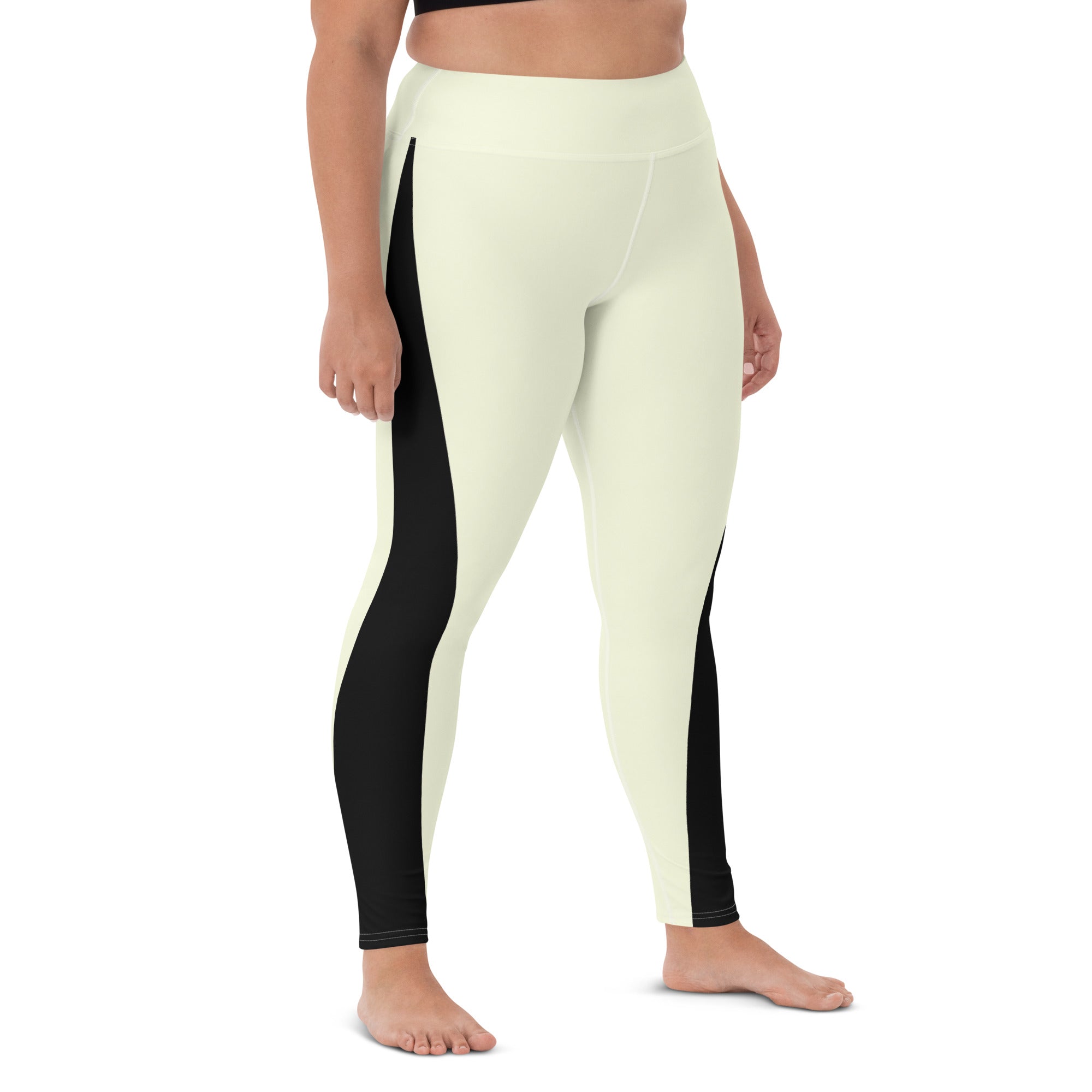 Whether you're hitting the studio or the streets, our Lemon Slice yoga pants have got you covered. The pale yellow color is complemented by a bold black triangle design, creating a unique look that's sure to stand out. 